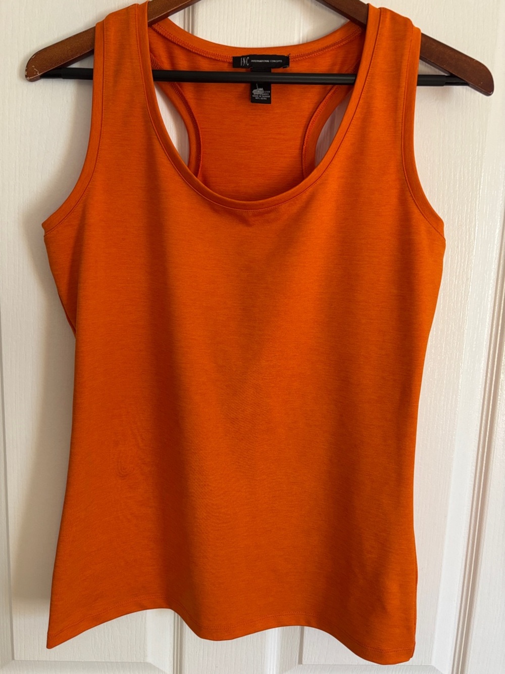 NWOT-INC Orange Racerback Tank Top. Never worn Great stretch!